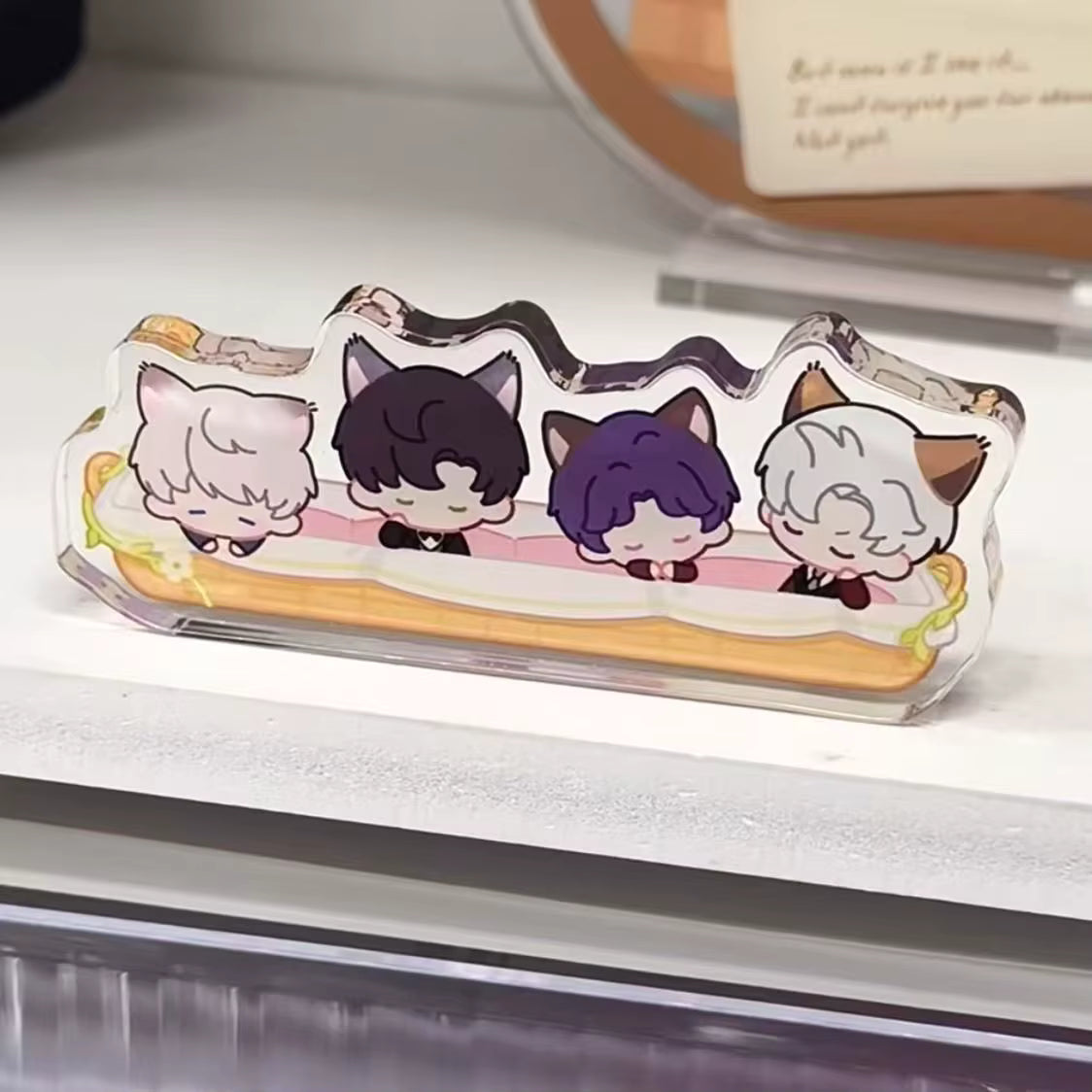 Love and Deepspace acrylic standee set – Xavier, Zayne, Rafayel, and Sylus displayed together.