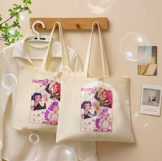 Kpop Demon Hunters canvas tote bag, large shoulder bag with vintage-inspired design, durable cotton canvas, fashion accessory for fans of the Huntr/x girl band.