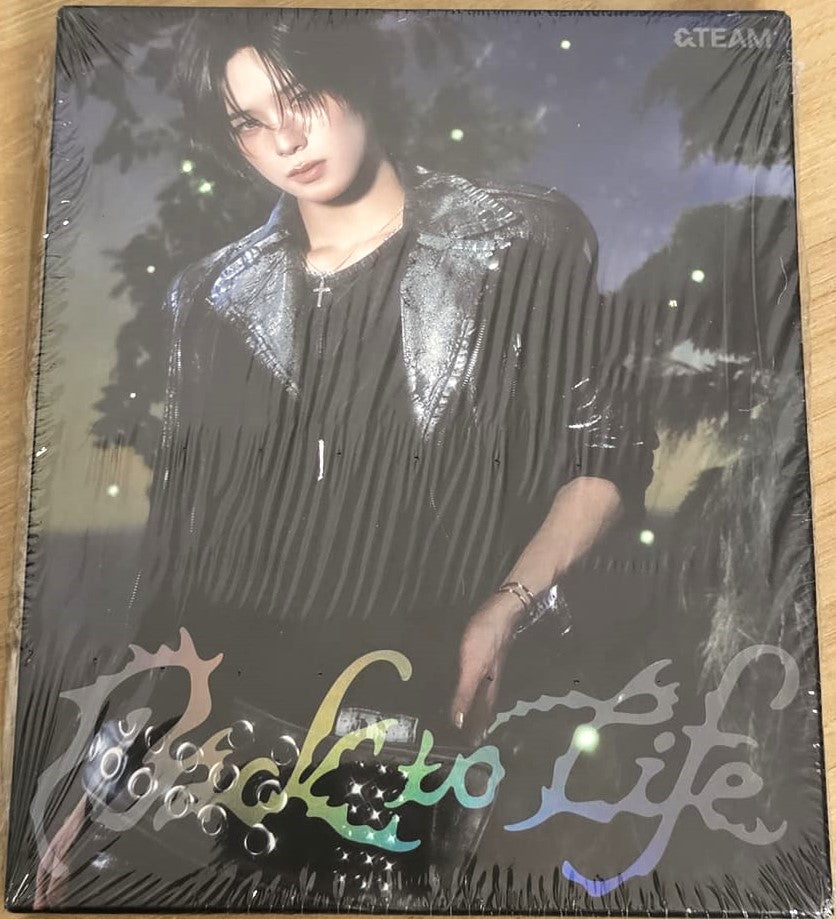 &TEAM Back to Life – ROAR ver. album cover featuring K, showcasing his individual concept photo in the dramatic “ROAR” theme styling.