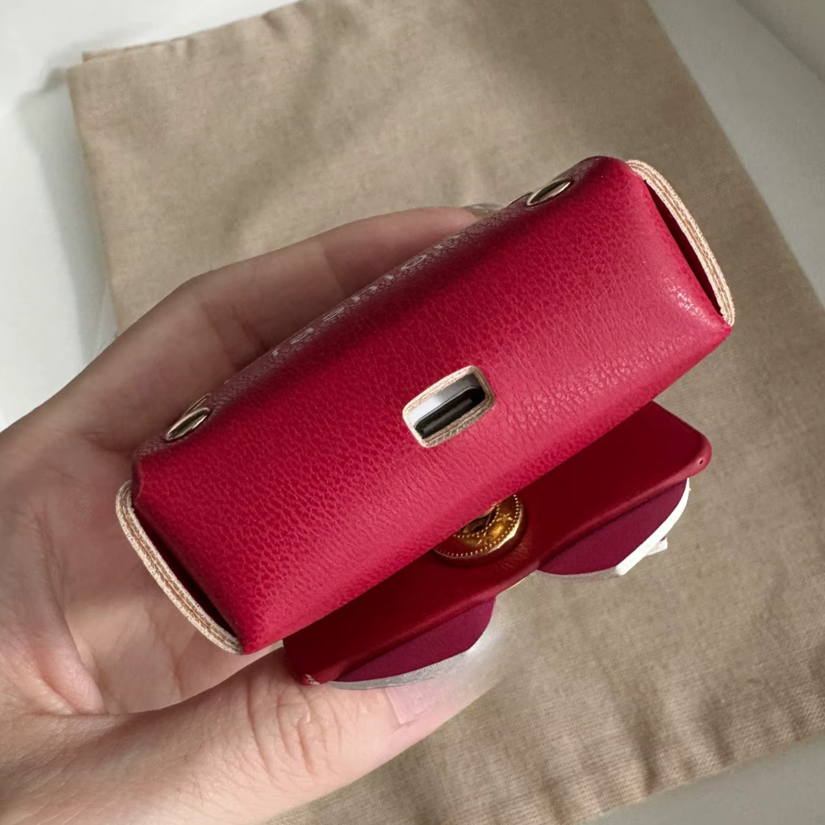 Bottom/underside of the bag showing area to charge ipods.