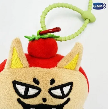 Close-up of the Tomafox GMMTV plush keychain front, showing fox ears, tomato body details, EF plush texture, and precise stitching.