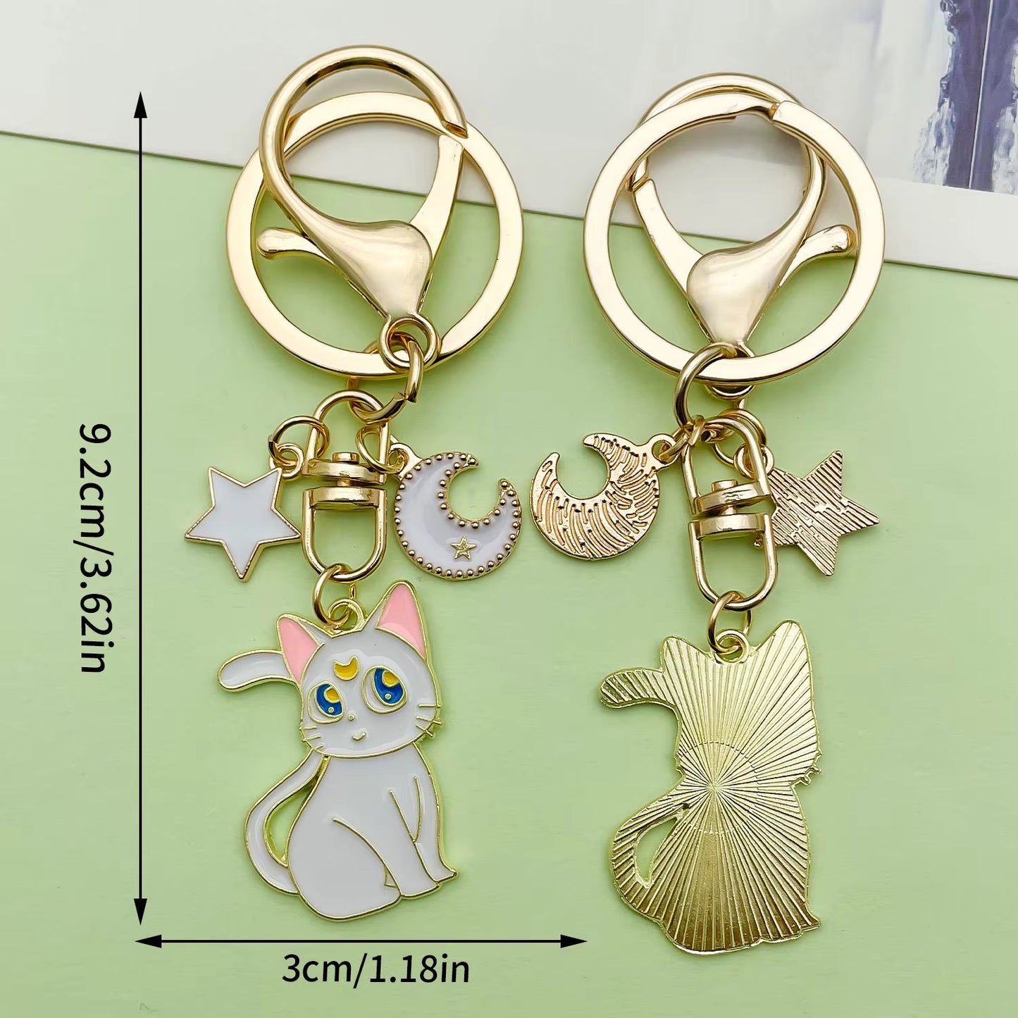 Artemis keychain with size dimensions displayed.